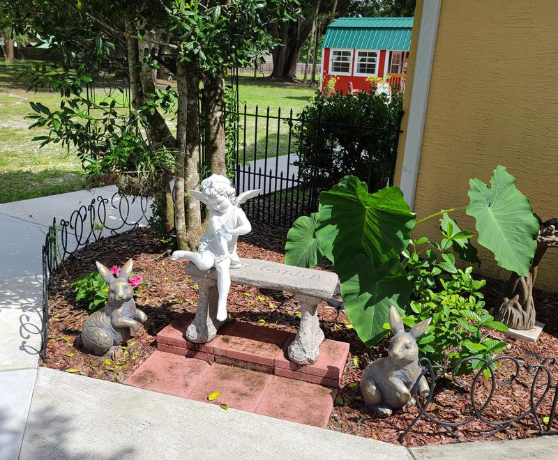Sitting Cherub with Butterfly Garden Statue