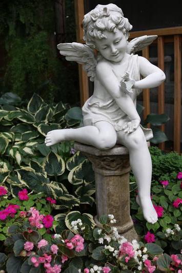 Sitting Cherub with Butterfly Garden Statue